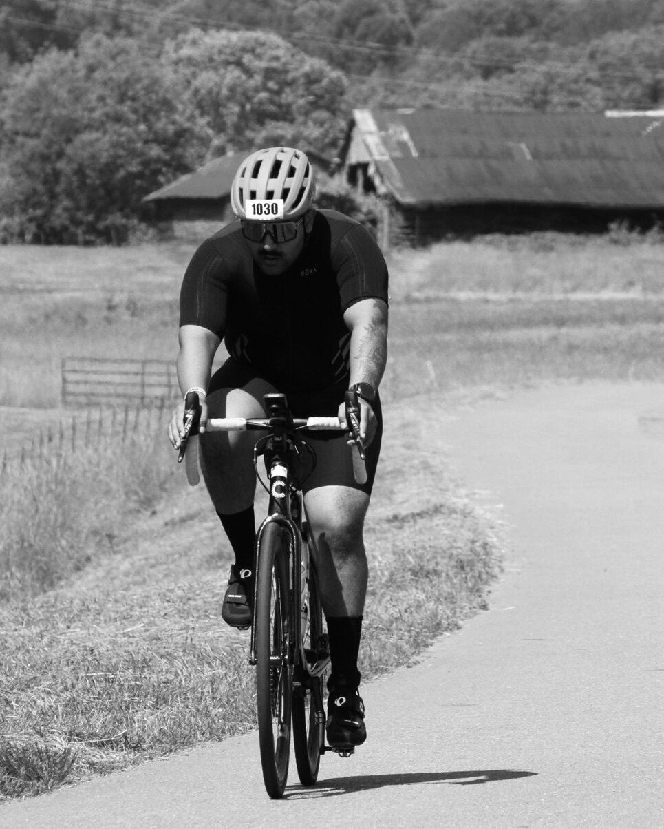 Cyclist racing on a rural road