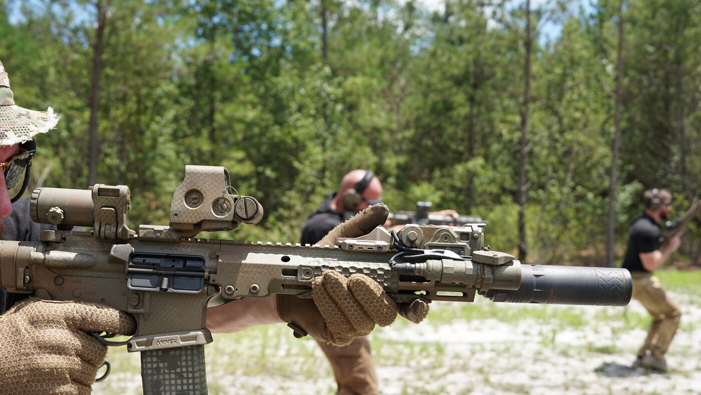 Suppressed rifle close-up